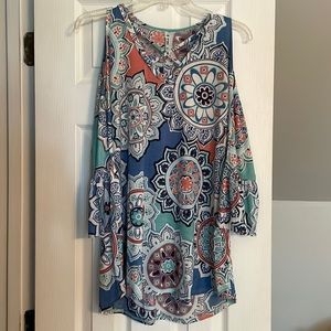 3/4 length Bell Sleeve flows top